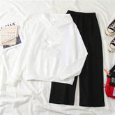 White hoodie and black flapper (track suit)